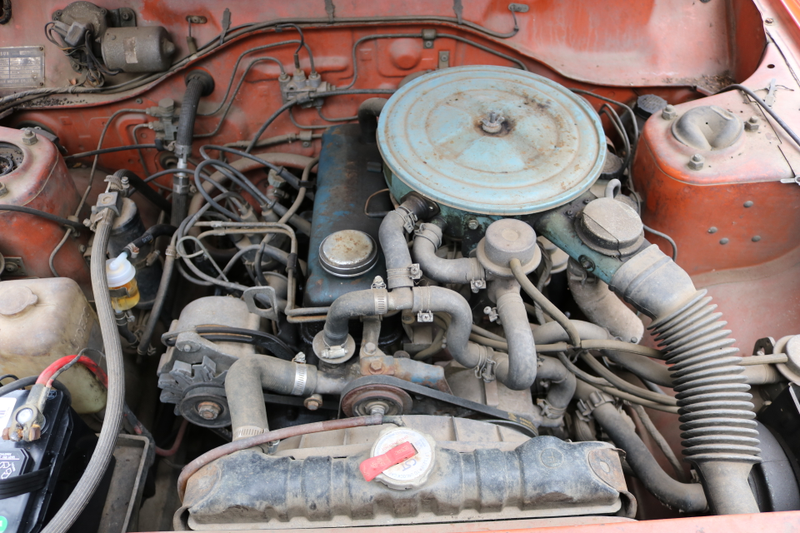 Below the valve cover it was plastered with oil.